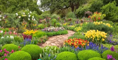 Collage artístico de 28 flores y frutas que comienzan con "I" en un jardín vibrante y soñador