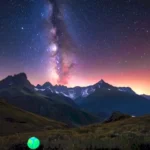 Cielo estrellado con montañas en silueta